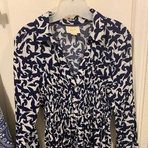 Blue and white smocked bird print tunic style top